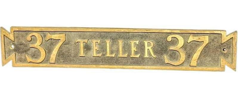 Vintage Brass Bank Teller Sign 37: Vintage Brass Bank Teller Sign 37. The sign is approx 16 3/4" x 1/4" x 3" and it weighs 3.27lbs. The sign has some markings, tarnish and color loss. Please see the images as they are part 