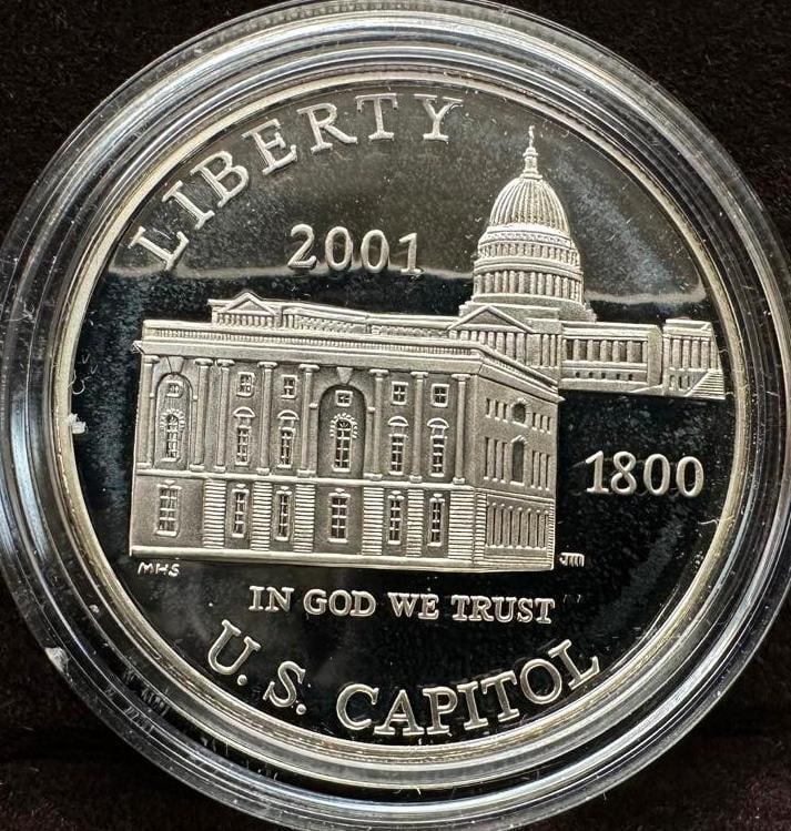 2001 P Capitol Visitor Center Silver Dollar: 2001 P Capitol Visitor Center Silver Dollar. This coin has been tested and researched to the best of our ability before listing. Please view the photos, as they are a part of the condition. DETAILS: M