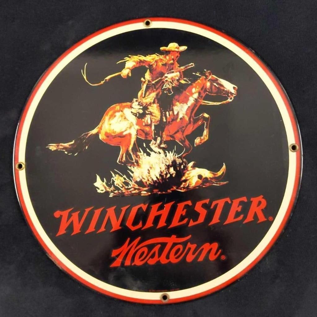 Winchester Western Retro Metal Gun Pub Sign: Winchester Western Retro Metal Gun Pub Sign. Here is a cool metal Winchester Western sign printed in 1993. The image shows a cowboy as he rushes off via horse with his Winchester rifle! Is approx 11&#
