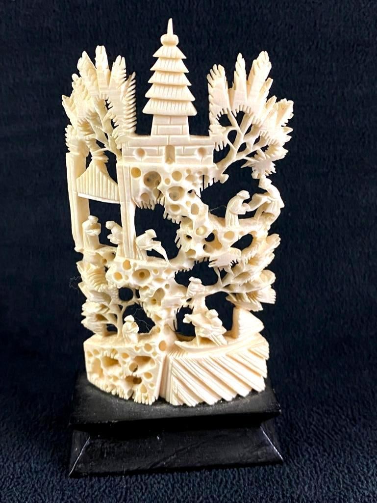 Chinese Carved Bone Scene: Chinese Carved Bone Scene Carved bone scene on a wooden stand made in Hong Kong, and brought back as a souvenir in the 1960s. In good condition with no known damage. Approximate size: 2.5" x 1.