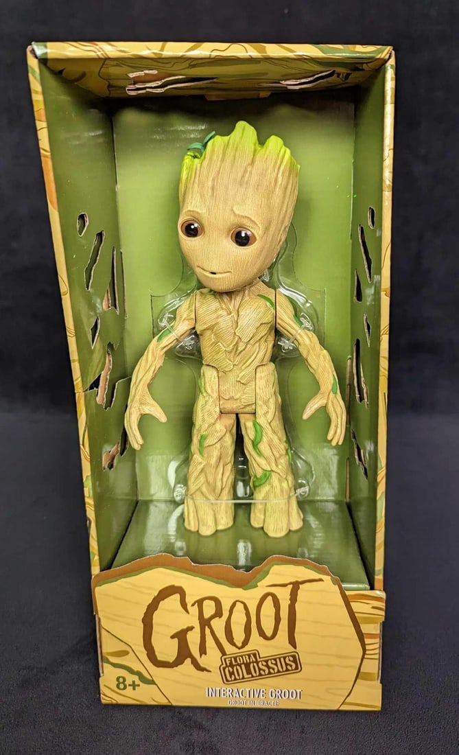 Disney Marvel Groot Interactive Robot C: Disney Marvel Groot Interactive Robot C. Interactive plastic Groot recognizes and responds back to 20 spoken phrases with sounds, music and movement. Articulated arms and legs with motorized legs and 
