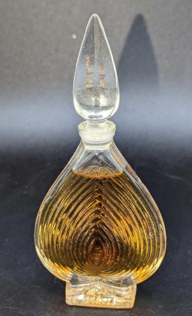 Vintage Chamade Guerlain Parfum 15ml: Vintage Chamade Guerlain Parfum ml. This is approx 2 1/4" x 1 1/8" x 4 3/4" and it weighs 0.16lb. The bottle has no chips or cracks, and is nearly filled to the top,