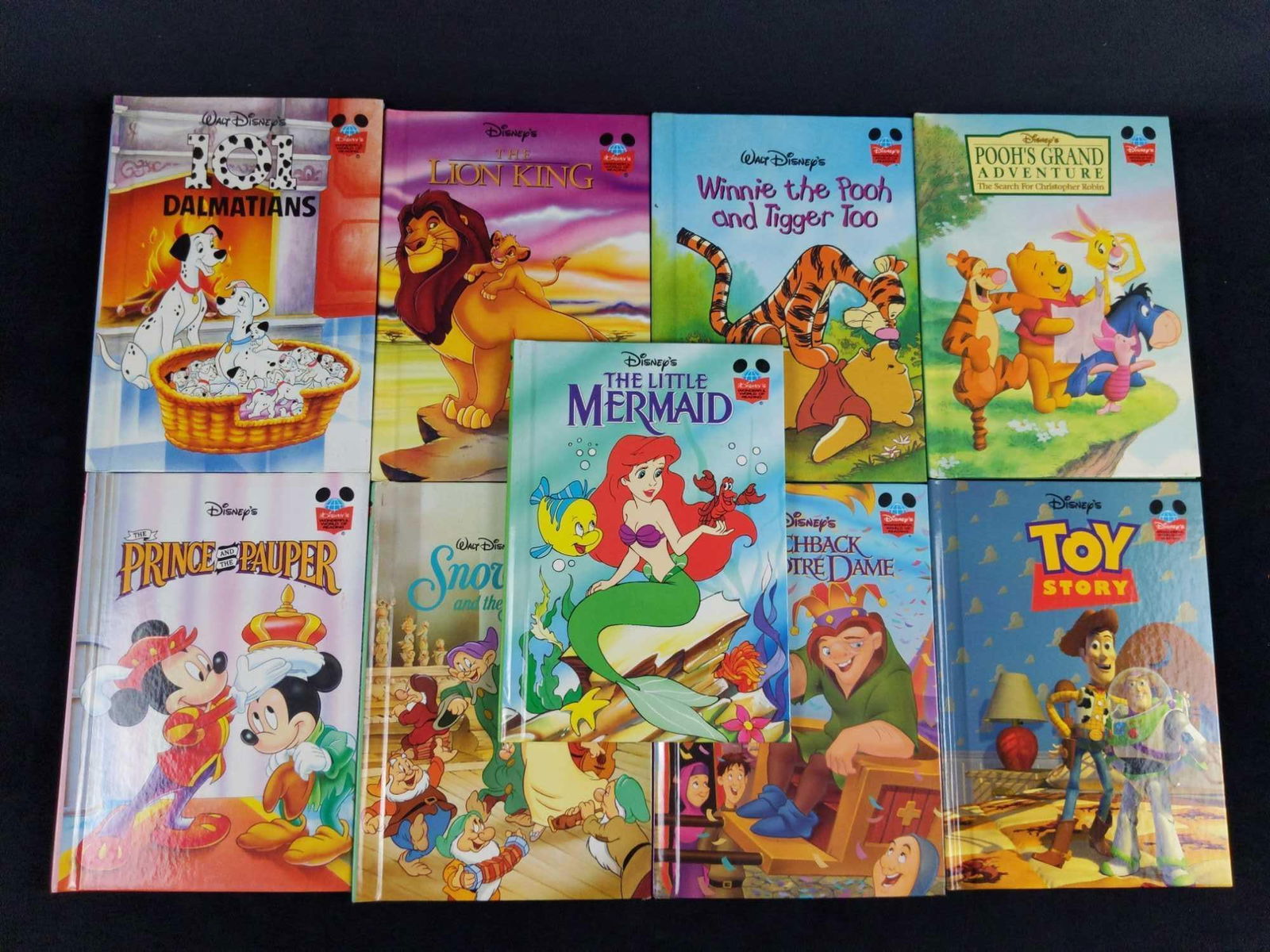 Disneys Wonderful World Of Reading Books Lot Of 9: This lot includes: (1) Winnie The Pooh And Tigger Too. (1) The Lion King. (1) 101 Dalmatians. (1) Toy Story. (1) The Hunchback Of Notr