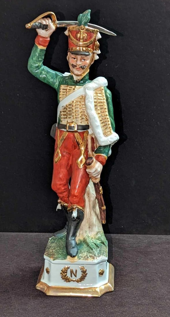 Vintage Capodimonte Sword Raised Solider Figurine JB: Vintage Capodimonte Sword Raised Solider Figurine JB. This is approx 3 3/4" x 3 3/4" x 12 1/2" and it weighs 1.72lb. The figurine has some light wear.