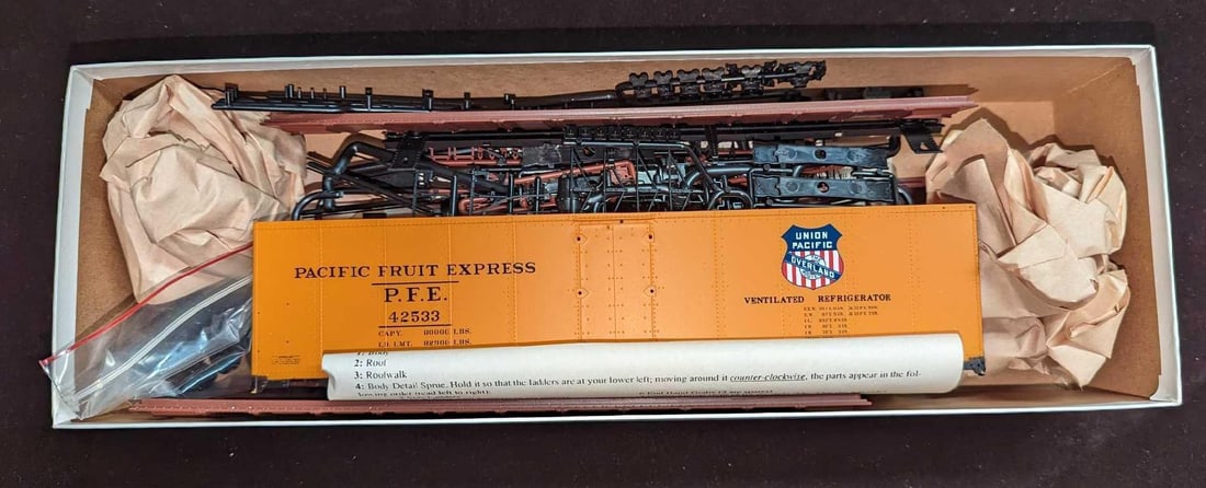 InterMountain Railway Fruit Express Ice Bunker Model Kit: InterMountain Railway Fruit Express Ice Bunker Model Kit. Comes in its original box that is approx 15" x 3" x 5" and it weighs 1.12lb. All are in a good, unused condition with no known dam