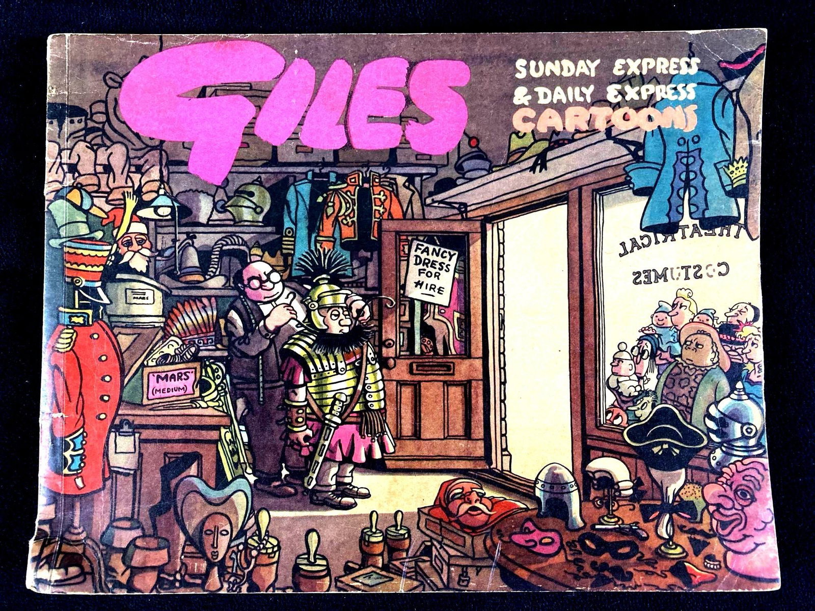 Giles Sunday Express and Daily Express Cartoons: Up for auction is a recent estate find, a Giles cartoon compilation from 1949 and 1950. The cartoons inside frequently showed up in newspapers and magazines during the late 1940's into the 1950