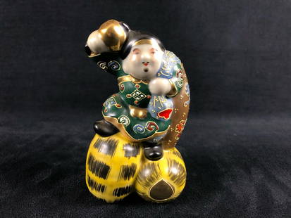 Rare Vintage Kutani 1960's Hand Painted Porcelain Gods of Good Fortune Figure Daikokuten: This vintage Kutani hand painted porcelain piece is in excellent condition with no chips cracks repairs or breaks. 4.5" tall. Daikokuten (???) Daikokuten is also one of the Shichifukujin. He