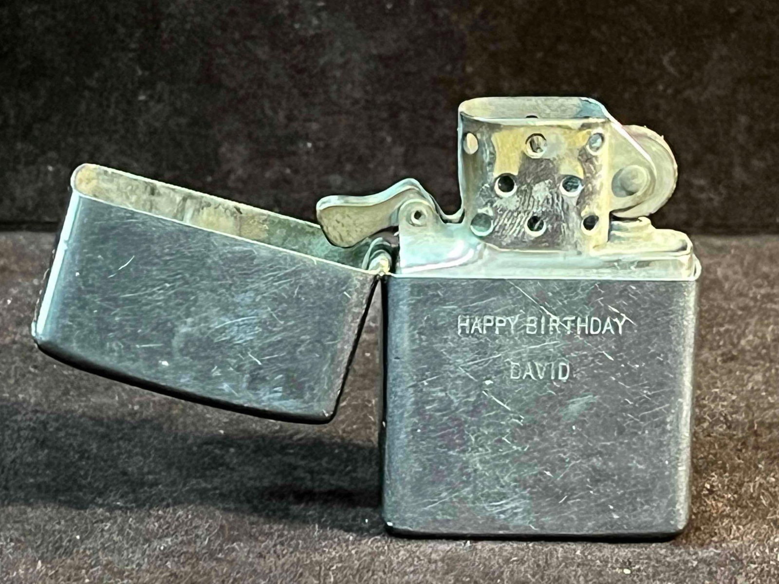 Vintage Bradford Zippo Lighter PA Engraved "Happy Birthday David": This lot contains a Vintage Bradford Zippo Lighter PA Engraved "Happy Birthday David". It is approx 1 1/2" x 1/2" x 2 1/4" and it weighs about 0.1lbs. Overall the Zippo Lighter is 