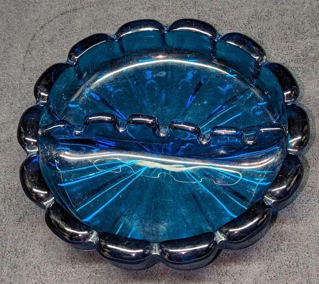 Vintage Viking Glass Azure Blue Glass Ashtray: Vintage Viking Glass Azure Blue Glass Ashtray. This is approx 6 1/2"x 6 1/2" x 1 1/4" and it weighs 1.46lb. The bottom has some scratches and some wear. Please see the images as they are p