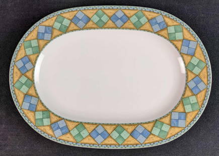 Retired Castillo By Noritake Oval Serving Platter: Castillo By Noritake Fine China Oval Serving Platter. Was released from 1996 - 2000. Is approx 16" x 11" x 1" and is a good, used cognition with no known damage.