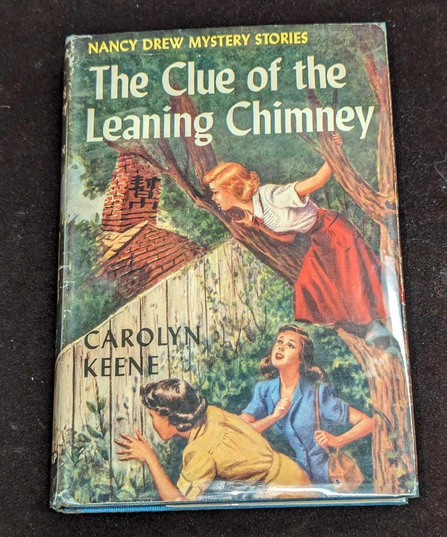 Nancy Drew #26 "The Clue Of The Leaning Chimney" 1949 Dust Jacket First Edition: Nancy Drew #26 "The Clue Of The Leaning Chimney" 1949 Dust Jacket First Edition. This is approx 5 1/4" x 1" x 7 3/4" and it weighs 0.60lb. The dust jacket has some shelf wear. This