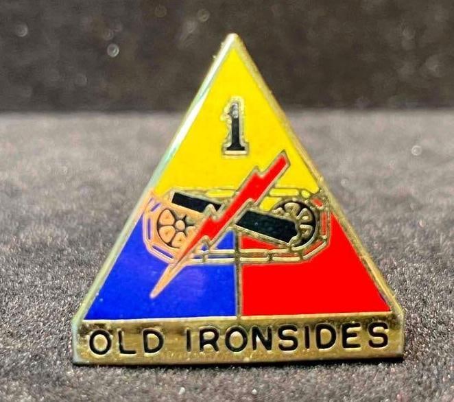 Old Ironsides 1st Armored Division Pin (F18): This lot contains a Old Ironsides 1st Armored Division Pin (F18). The pin fits in a small 3 3/4" x 2 1/4" plastic bag and it weighs about 0.01lbs. Overall the pin is in good used condition wit