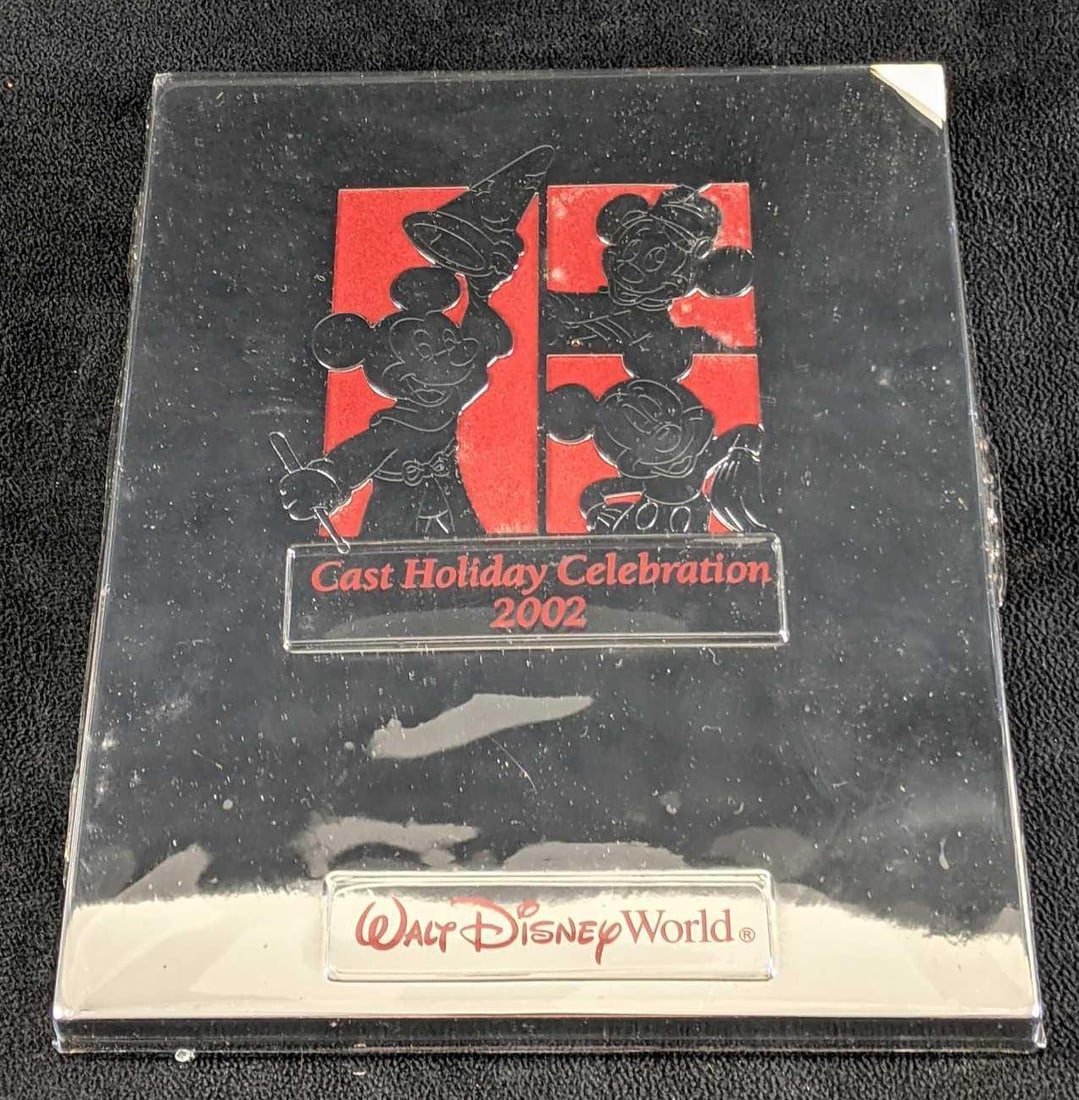 Disney Cast Member Exclusive Picture Frame: Disney Cast Member Exclusive Frame This cast member frame is from 2002 and it's a beautiful display frame that could hold a 5x7 picture. In original packaging. Weight 1.6lbs box dimensions: 9in x
