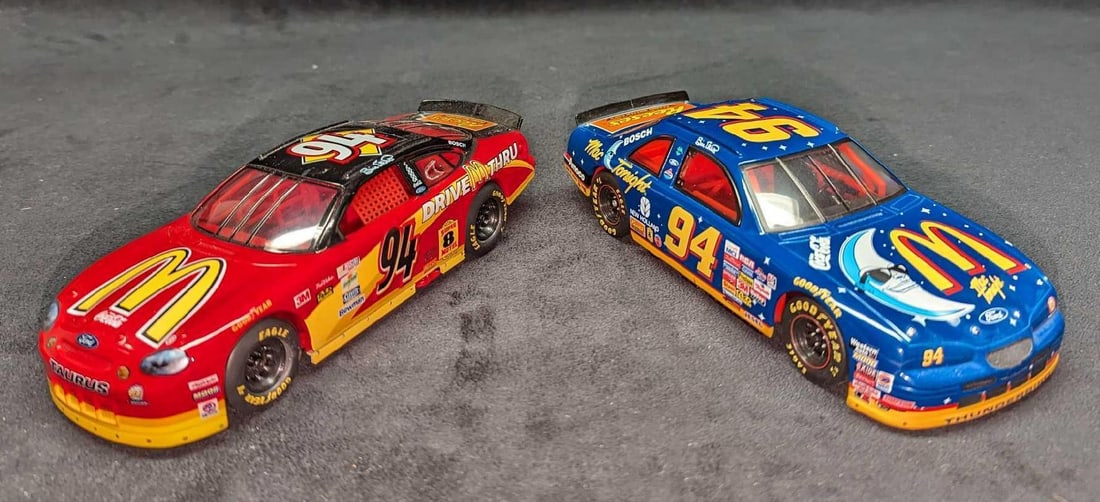 2 1/24th McDonald's Bill Elliott Stock Cars: 2 1/24th McDonald's Bill Elliott Stock Cars. This lot includes: (1) Racing Champions 1/24th Diecast McDonald's #94 Bill Elliott Stock Car. This is approx 3" x 8" x 2 1/4". (1) Raci