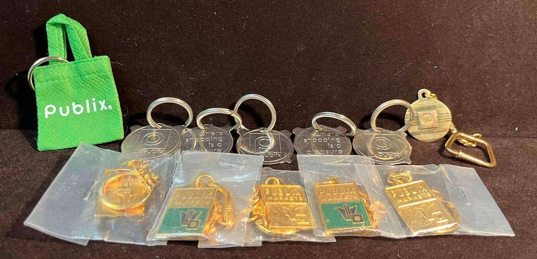 Vintage Publix Enamel Pins & Key Chains + Bonus Mini Shopping Bag (F18): This lot contains a Vintage Publix Enamel Pins & Key Chains + Bonus Mini Shopping Bag (F18). The pin bundle fits together in a 7" x 6 3/4" plastic bag and altogether weighs about 0.2lb