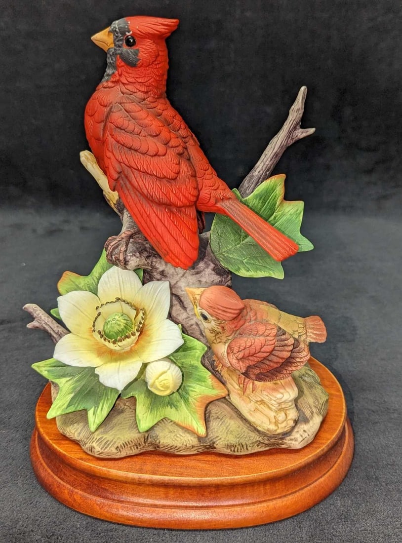 Andrea By Sadek Cardinal Figurine: Andrea By Sadek Cardinal Figurine. This porcelain figurine is approx 6 1/4" x 4 1/2" x 8 3/8" and it weighs 1.89lb. The base is approx 7 1/4" x 6 1/4" x 1" and it weighs 0.69lb