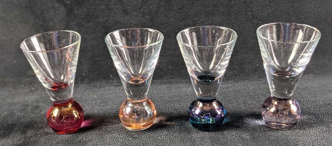 Set Of Four Cordials Shot Glasses Bubble Ball: This lot consists of four cordial/shot glasses with colorful bubble balls. The maker and date of creation is unknown. Each glass is approx 2" x 2" x 3 1/2" and together they all weigh 0.99
