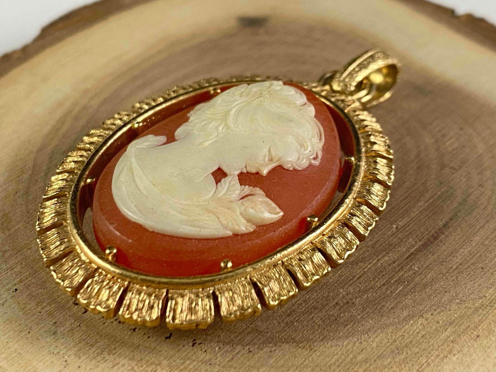 Gold Plated Pink Cameo Pendant: Gold Plated Pink Cameo Pendant Gold Plated 2" x 1 1/4" 18.2 Grams will fit up to a 4mm necklace