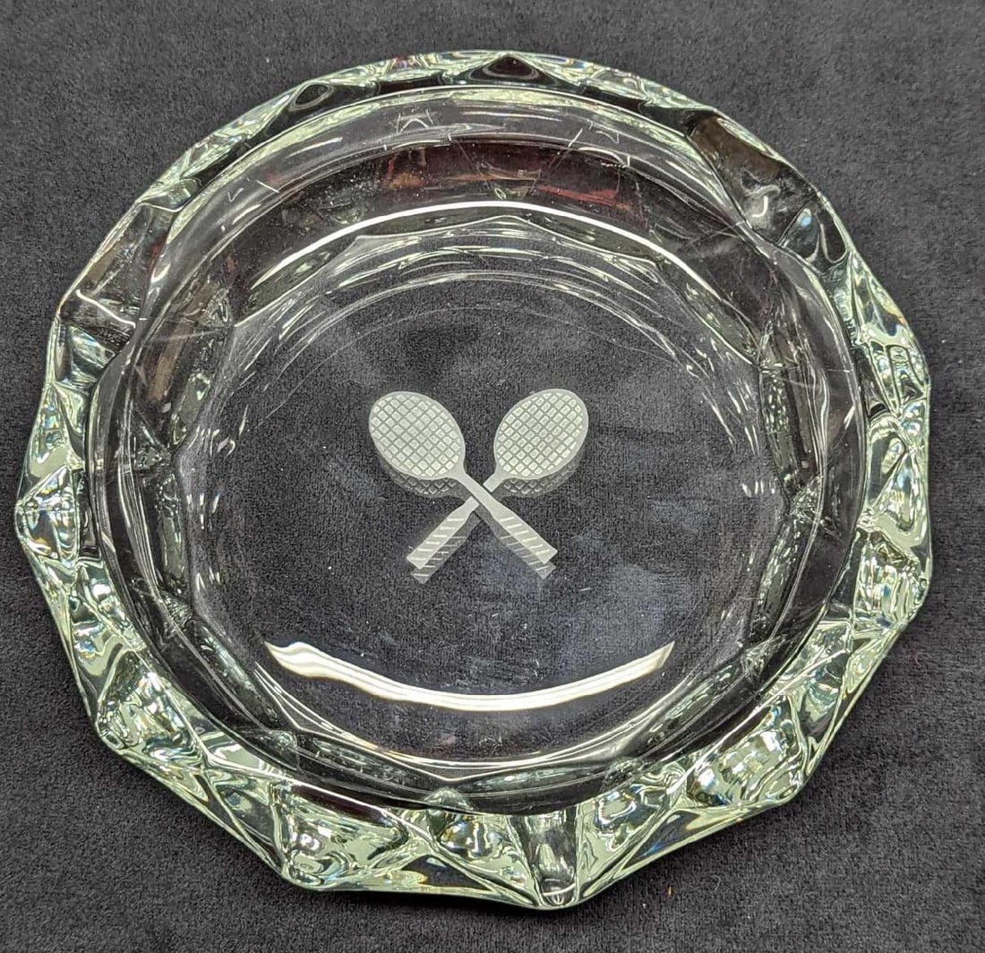 Vintage Crossed Tennis Rackets Crystal Ashtray: Vintage Crossed Tennis Rackets Crystal Ashtray. Maker and date of creation is unknown. The ashtray is approx 8 1/4" x 8 1/4" x 2 3/8" and it weighs 3.16lbs. The ashtray has no cracks or ch