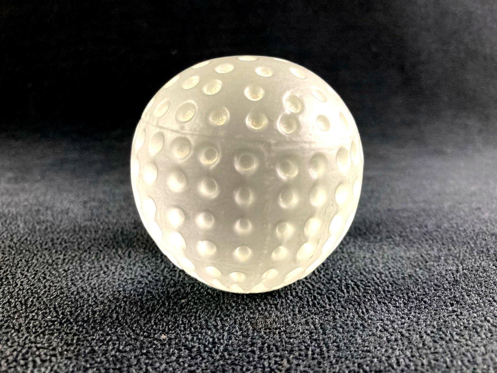 Handcrafted Glass Golfball by Sylvestri: This lot includes: (1) Handcrafted Glass Golfball by Sylvestri Condition is used and see photographs for additional details. The golf ball is glass and was made by the company Syl
