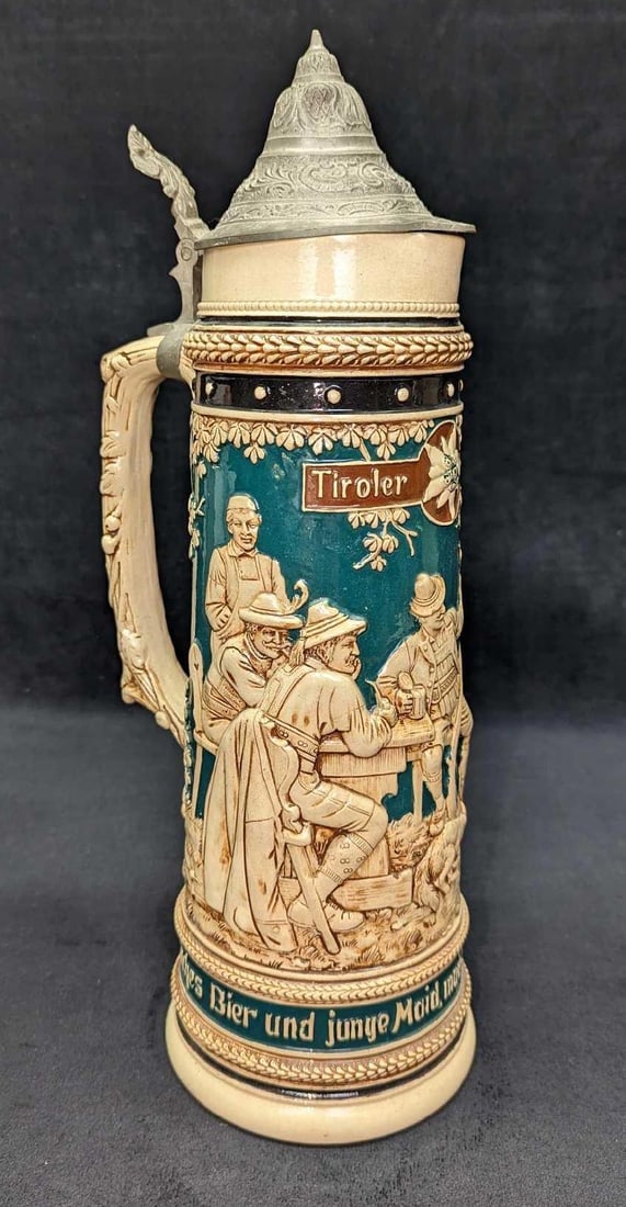 Vintage 15" Lidded Tiroler Leben Stein Pouring Vessel: Vintage 15" Lidded Tiroler Leben Stein Pouring Vessel. This is approx 6 1/2" x 5" x 15 3/8" and it weighs 3.65 lbs. The ceramic stein's pewter top has some dents and does not prope