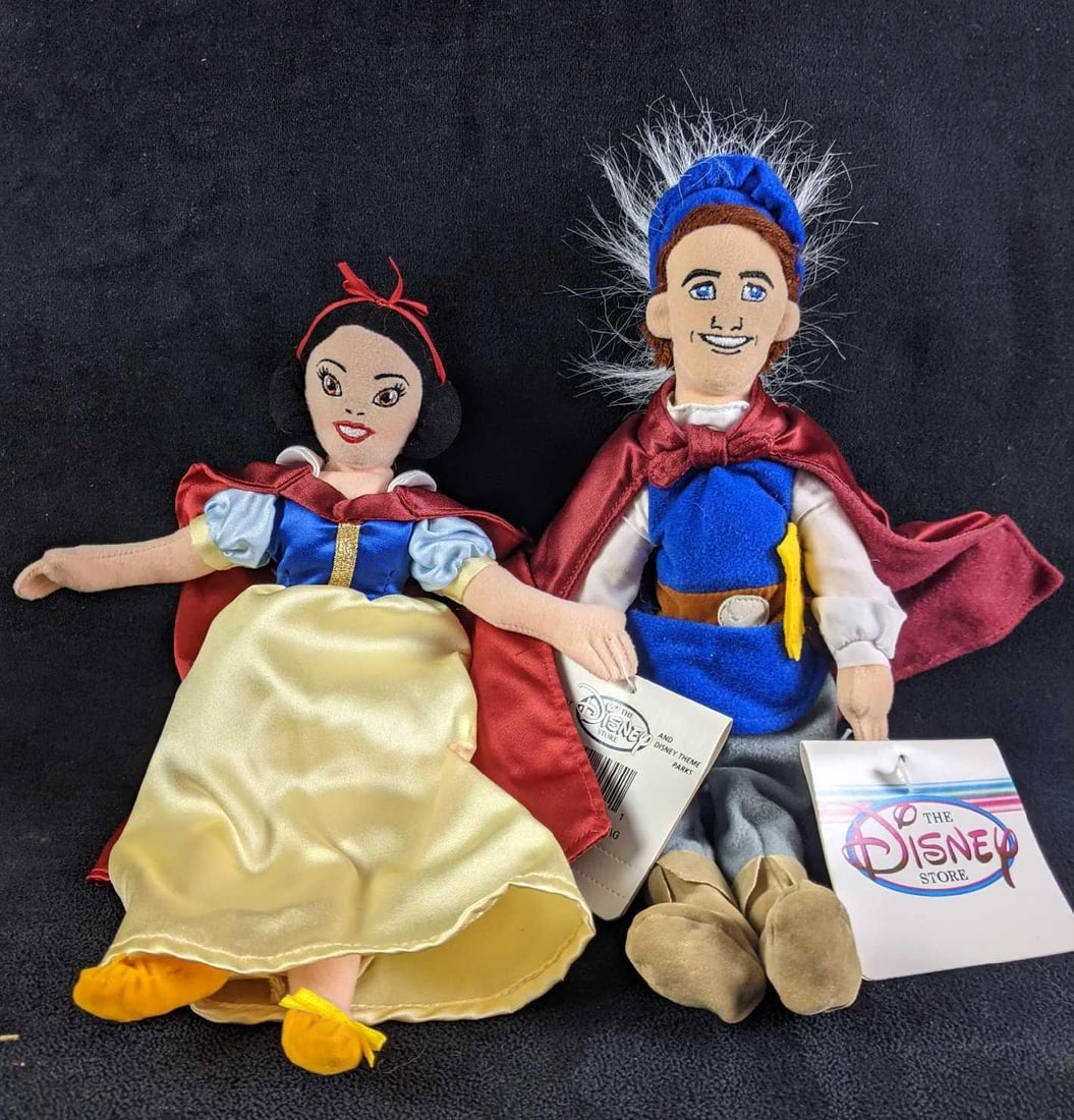 Disney's Snow White and Prince Plush Dolls: Disney's Snow White and Prince Plush Dolls This is a Snow White and her Prince from the movie Plush Dolls. They are in good condition with no known damage. They are the cutest couple! 10in tall We