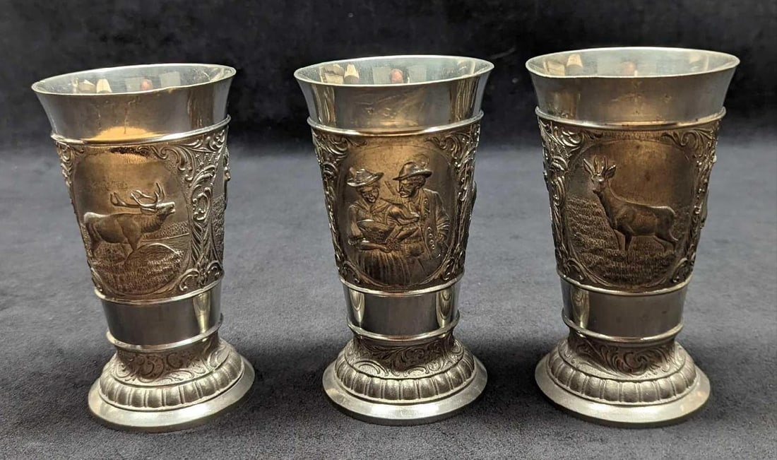 3 Vintage German Zinn Becker Pewter Wine Cups: 3 Vintage German Zinn Becker Pewter Wine Cups. Each wine cup is approx 3" x 3" x 5 1/2" and together they weigh 2.36 lbs. The wine cups are in good, vintage condition with some light scrat