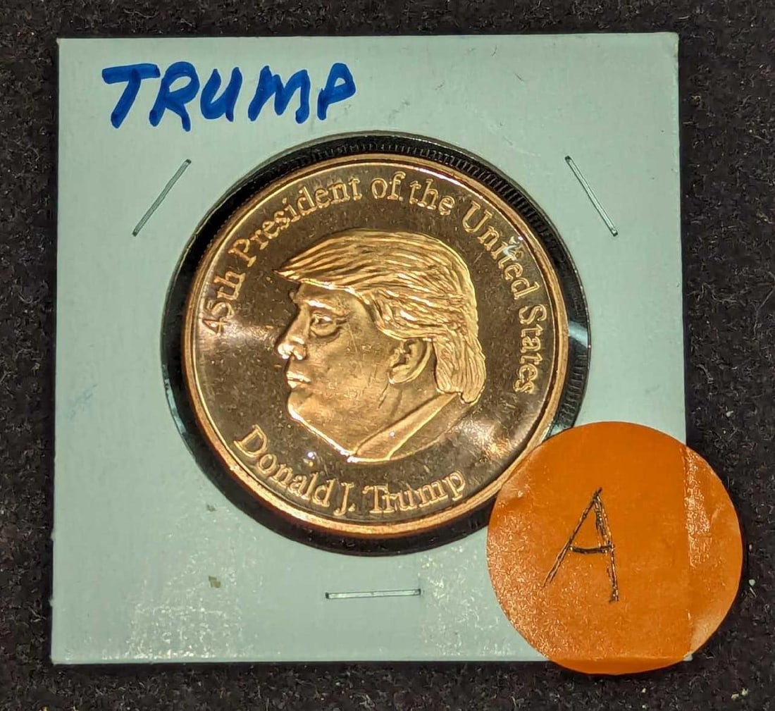 Donald J. Trump Copper Coin 45th President Coin: Donald J. Trump Copper Coin 45th President Coin This coin is 1oz of .999 Fine Copper. This coin is in a protective casing that is approx 2 1/2" x 2 1/2" and it weighs 0.06lb.