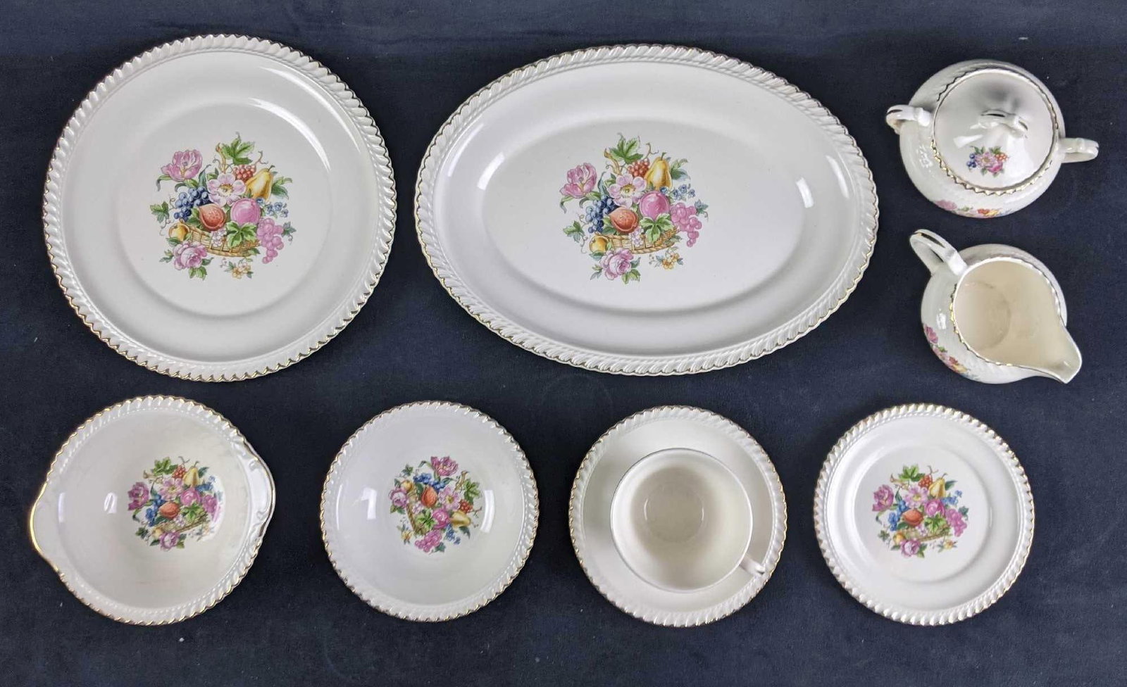 Floral China Tea and Plate Set 49pc Set: Floral China Tea and Plate Set 49pc Set This tea set is unbranded. It is in good used condition. The same designs on each piece. May have slight age wear. This is a beautiful set that includes 8 Dinne