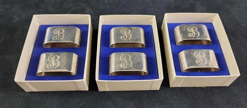 Oval Silver Plated Napkin Holders: Oval Silver Plated napkin holders, maker unknown. Stamped E.P.N.S S/G England on the back of each holder and the front has the letter "B" is engraved. In good used condition with signs of use.