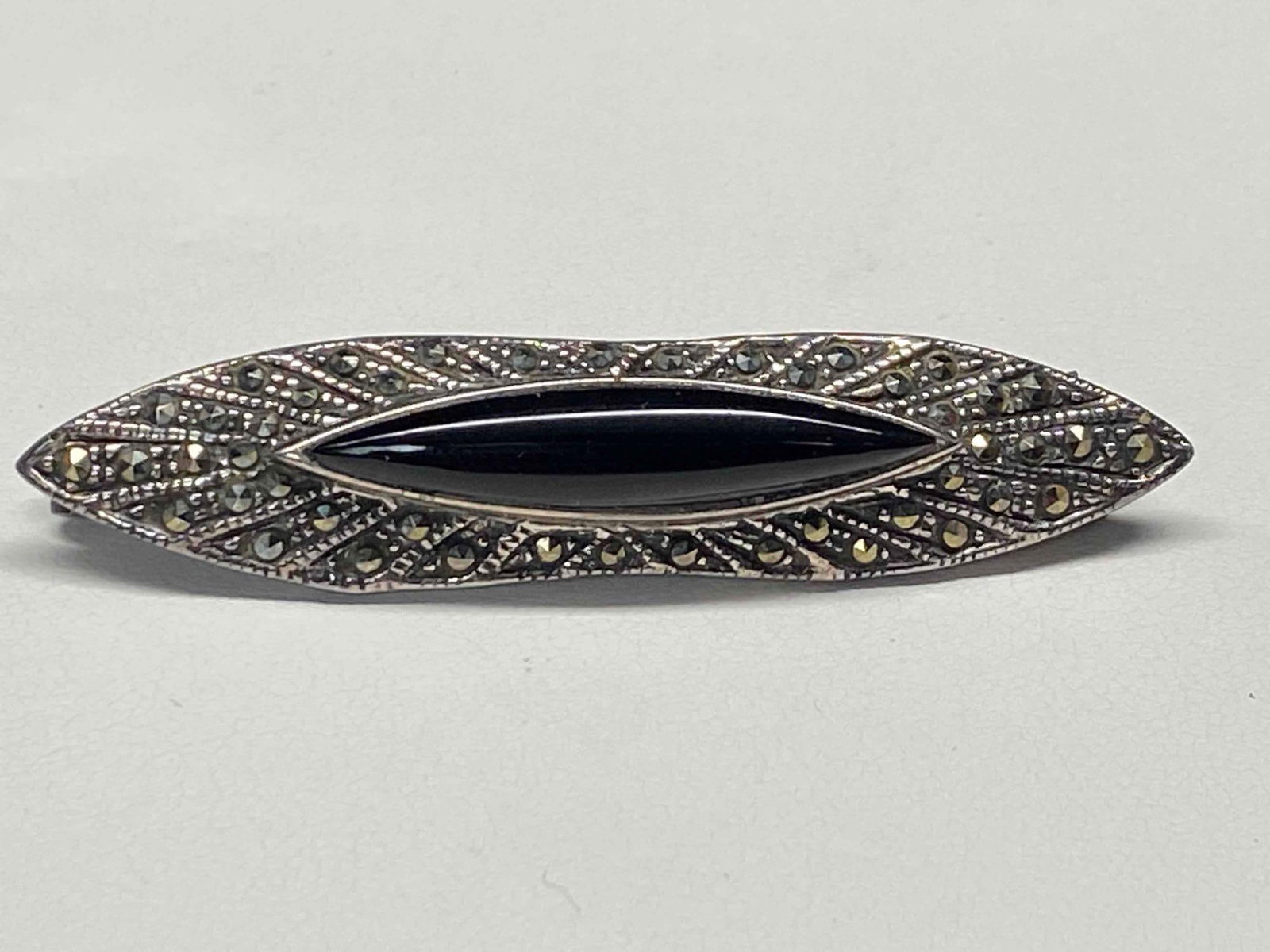 Vintage Sterling Silver Marcasite & Onyx Pin / Brooch: The following Vintage treasure has been tested and researched prior to listing. Please view all our pictures prior to bidding they are part of our description . Happy bidding Metal - Sterling Color - 
