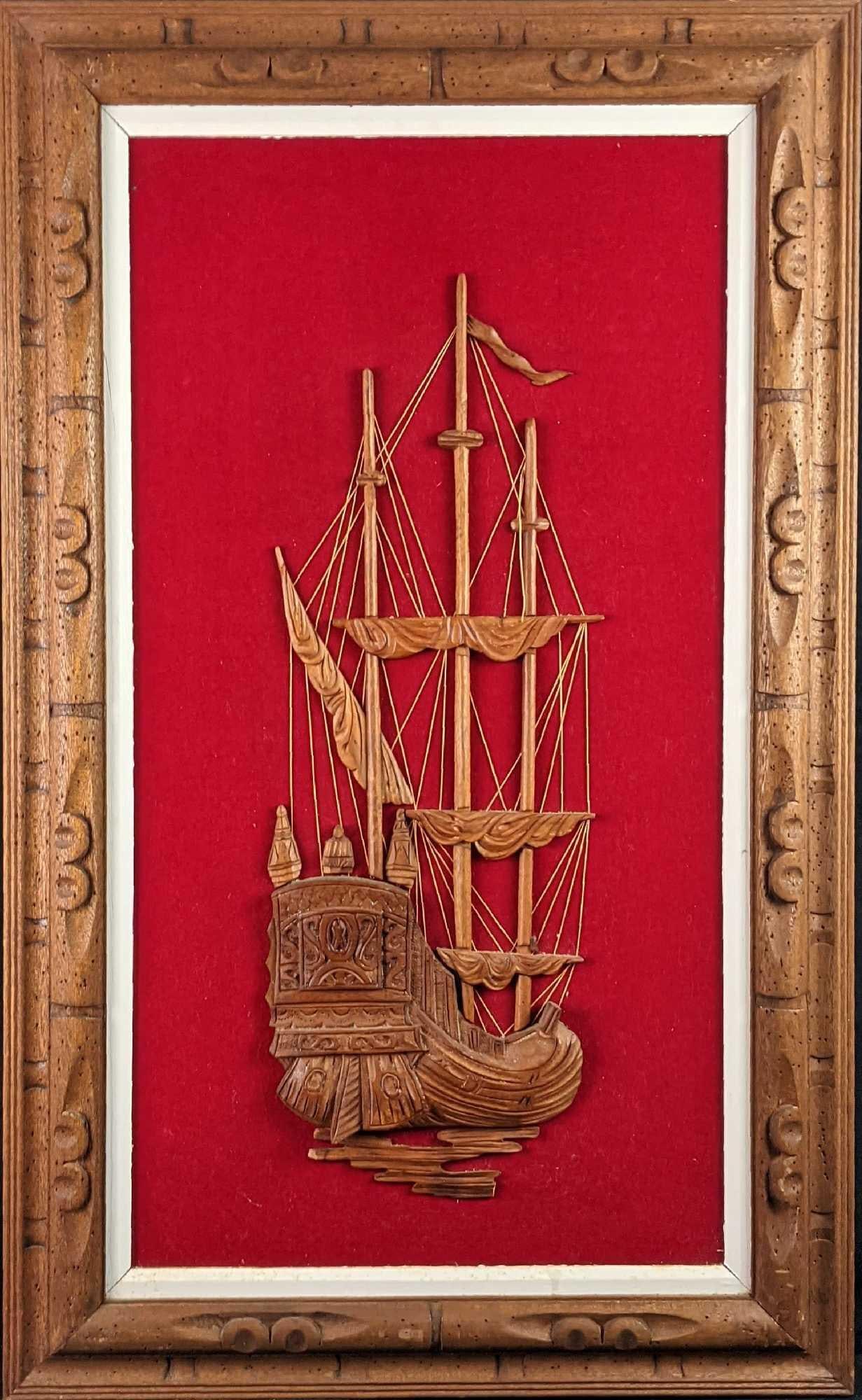 Framed Mid Century Wood Carved Boat With Red Velvet Background B: By Han Palace Art. Is approx 23 1/2" x 2" x 39". Is in a good, vintage condition with wear and torn backing paper. There is also some dust and debris on the red velvet.
