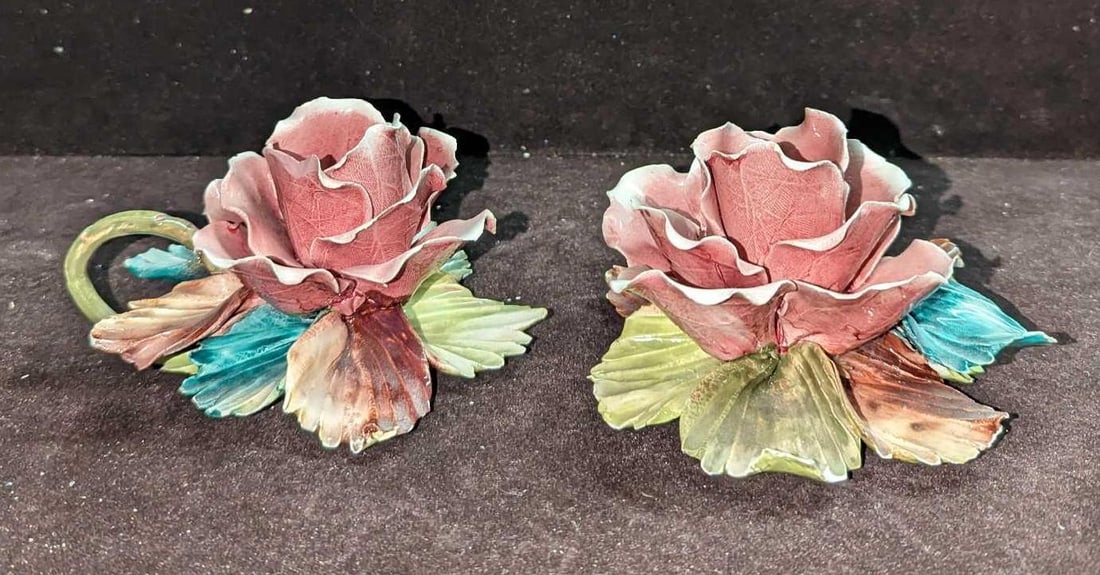 2 Vintage Capodimonte Rose Italian Candle Holder: 2 Vintage Capodimonte Rose Italian Candle holder. Each candle holder is approx 5 3/4" x 5"x 3" and the total weight is 0.97lb. The candle holders have chips on the petals. Please see the i