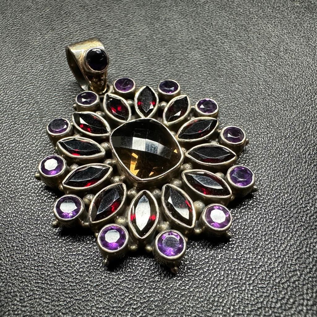 Sterling Flower Pendant Amethyst, Garnet, Quartz: This piece of jewelry has been tested and researched prior to listing. Please view all our pictures they are part of our description. DETAILS: Metal - Sterling Silver Color - Silver Stones - Amethyst,