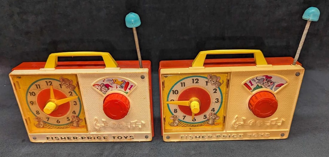 Vintage Fisher Price Toys Dickory Dock Music Box: Vintage Fisher Price Toys Dickory Dock Music Box. When the knob is turned, the music starts, the clock's hands move, and the graphic above the knob moves. One fully works, while the other does not