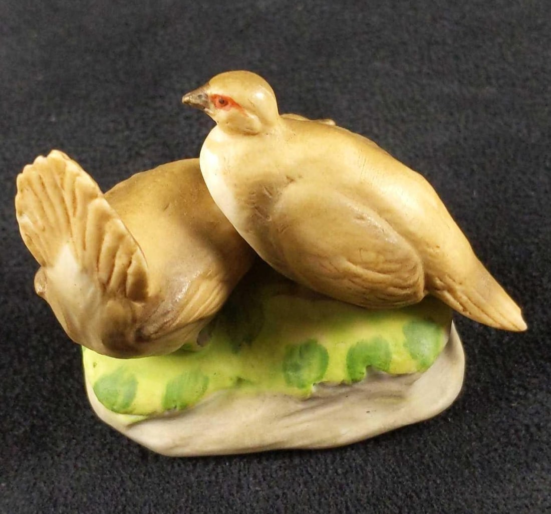 Vintage Capodimonte Birds Italian Porcelain Figurine: Hand-painted porcelain figurine of two little birds on a small grass hill. Figurine is approx 3" x 1 1/2" x 2 1/2". The figurine is in good, vintage condition with some wearing on the bott