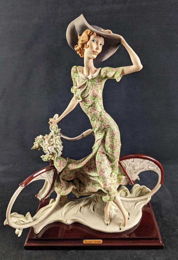 Giuseppe Armani The Bicycle Spring Statue: Giuseppe Armani The Bicycle Spring Statue Open Edition "The Bicycle Spring" Giuseppe Armani Statue. The figurine is made of Capodimonte porcelain and is approx 10 1/2" x 4 1/2" x 15 1