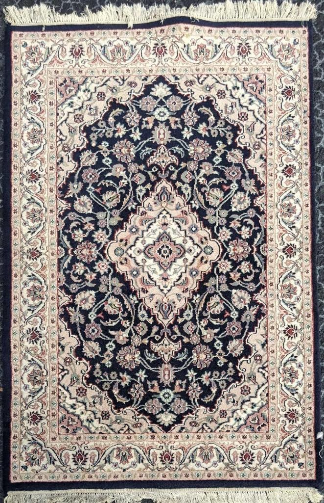 Luxury Plush Persian Style Area Rug: This plush rug is beautiful with its designs. The colors are rich and not faded and the wool is thick and plush. This rug is lightly used but has no known damage besides some discoloration on the edge