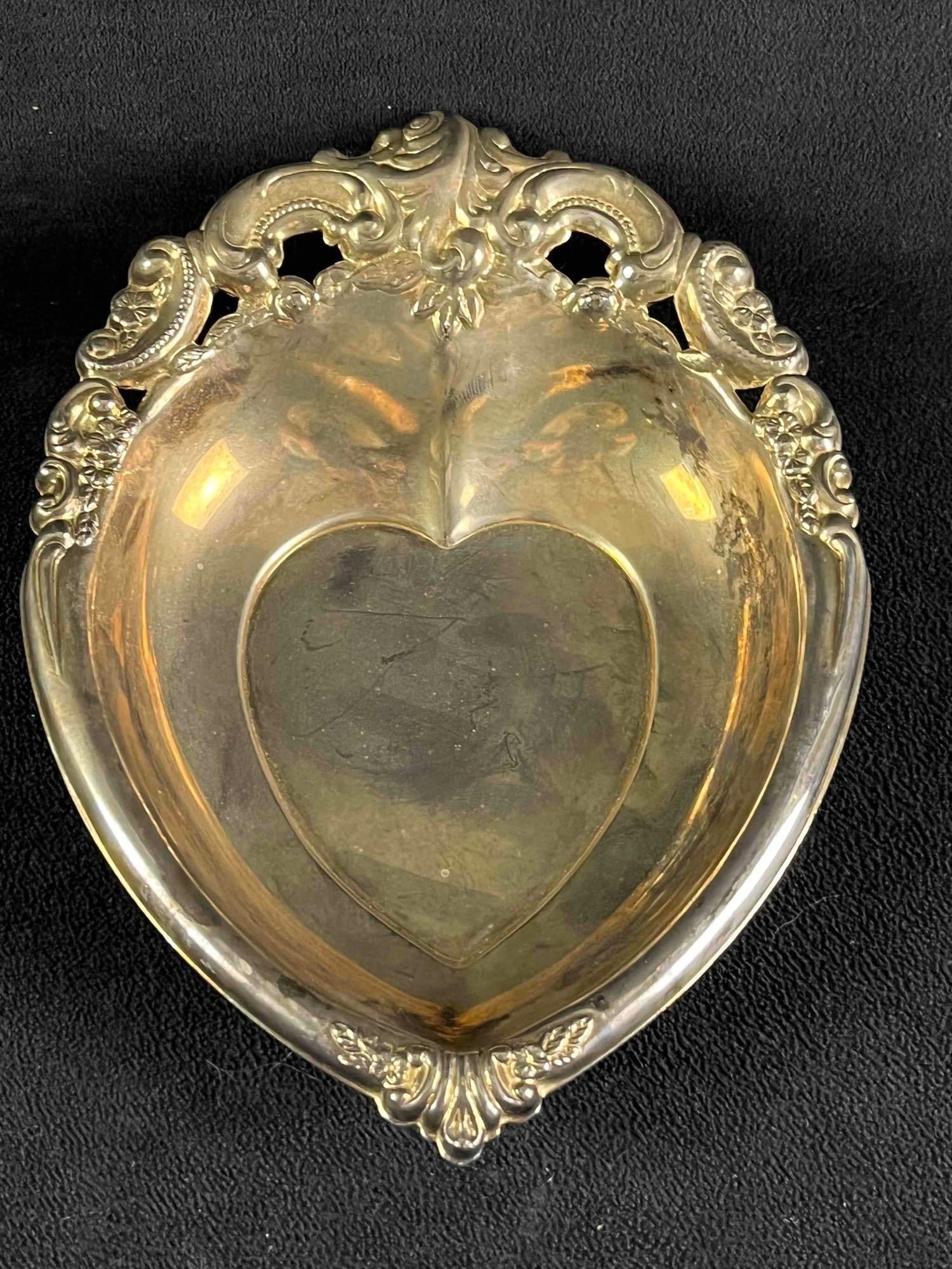 Silver Plated Heart Bowl: Silver Plated Heart Bowl This vintage heart-shaped bowl is in good condition with slight tarnish. approx 8in x 6in x 1in weight: