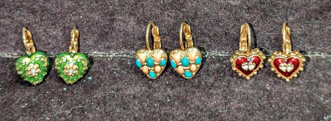 3 Pairs Of Joan Rivers Enamel Heart Earrings: 3 Pairs Of Joan Rivers Enamel Heart Earrings. This lot includes: (1) Joan Rivers Enamel Heart Earrings. Features peach and blue enamel on gold-tone earrings. Each is approx 1/2" x 3/8" x 3/4&#