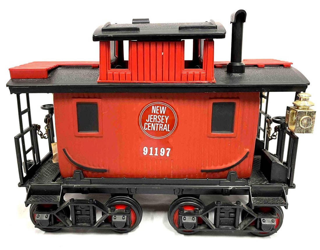 Empty Jim Beam N.J. Central Caboose 91197: This lot contains a Jim Beam N.J. Central Caboose 91197. It is approx 11 1/4" x 5 1/2" x 8 1/4" and it weighs about 3lbs. Overall the Jim Beam Caboose is in good used condition with some l