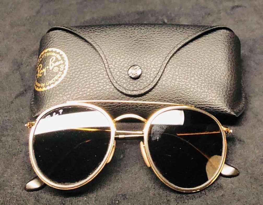Ray Ban Sunglasses RB3647-N Polarized With Original Case: This lot contains a Ray Ban Sunglasses RB3647-N Polarized With Original Case. Made In Italy. Ray Ban 51022 Round Double Bridge. The case is approx 2 3/4" x 6 1/2" x 1 1/2" while the glasse
