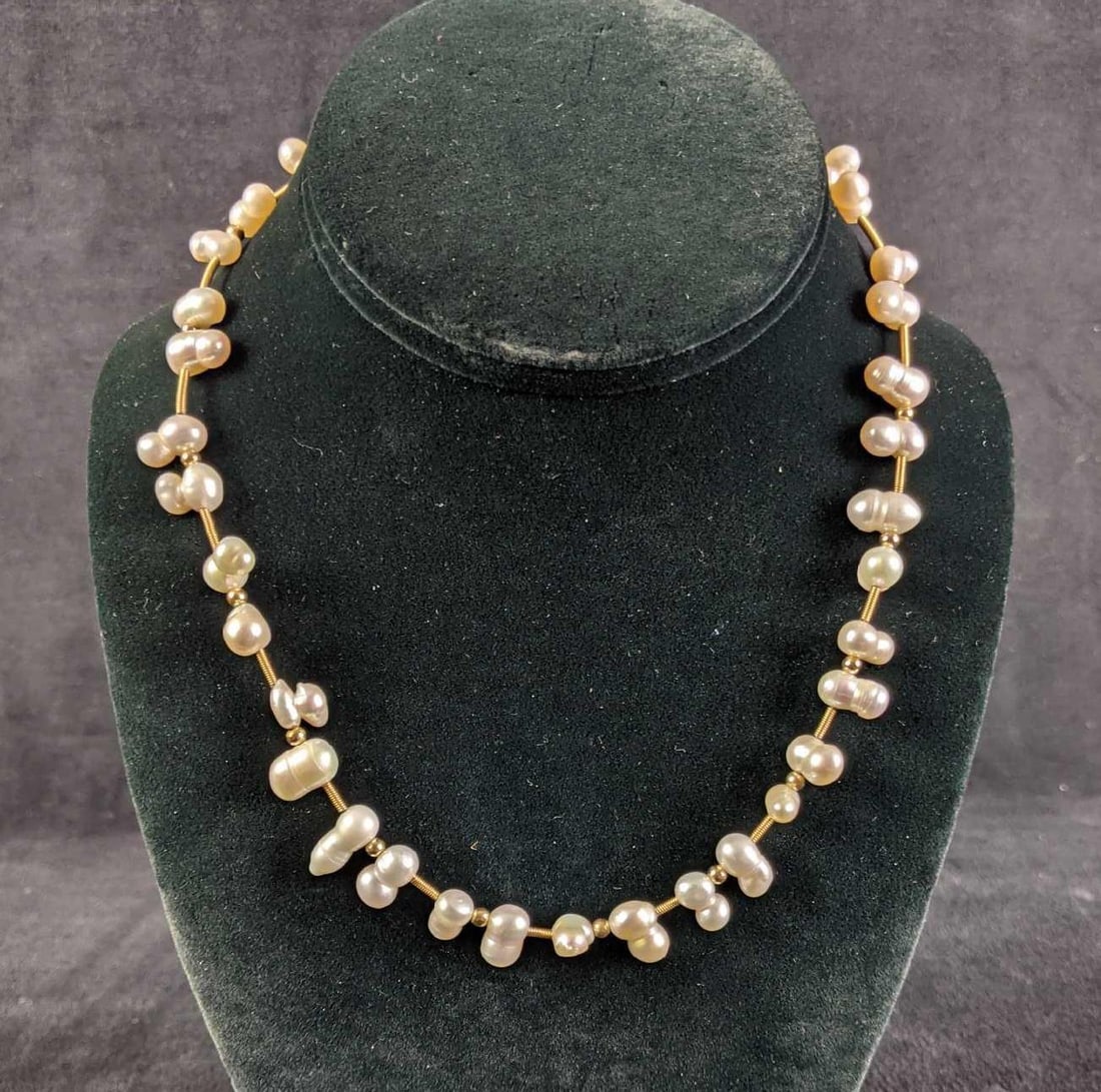 Natural River Pearl Gold Plated Necklace: Natural River Pearl Gold Plated Necklace This is gently used. In great condition. It is gold-plated with natural river pearls. This is a beautiful piece short necklace 8in