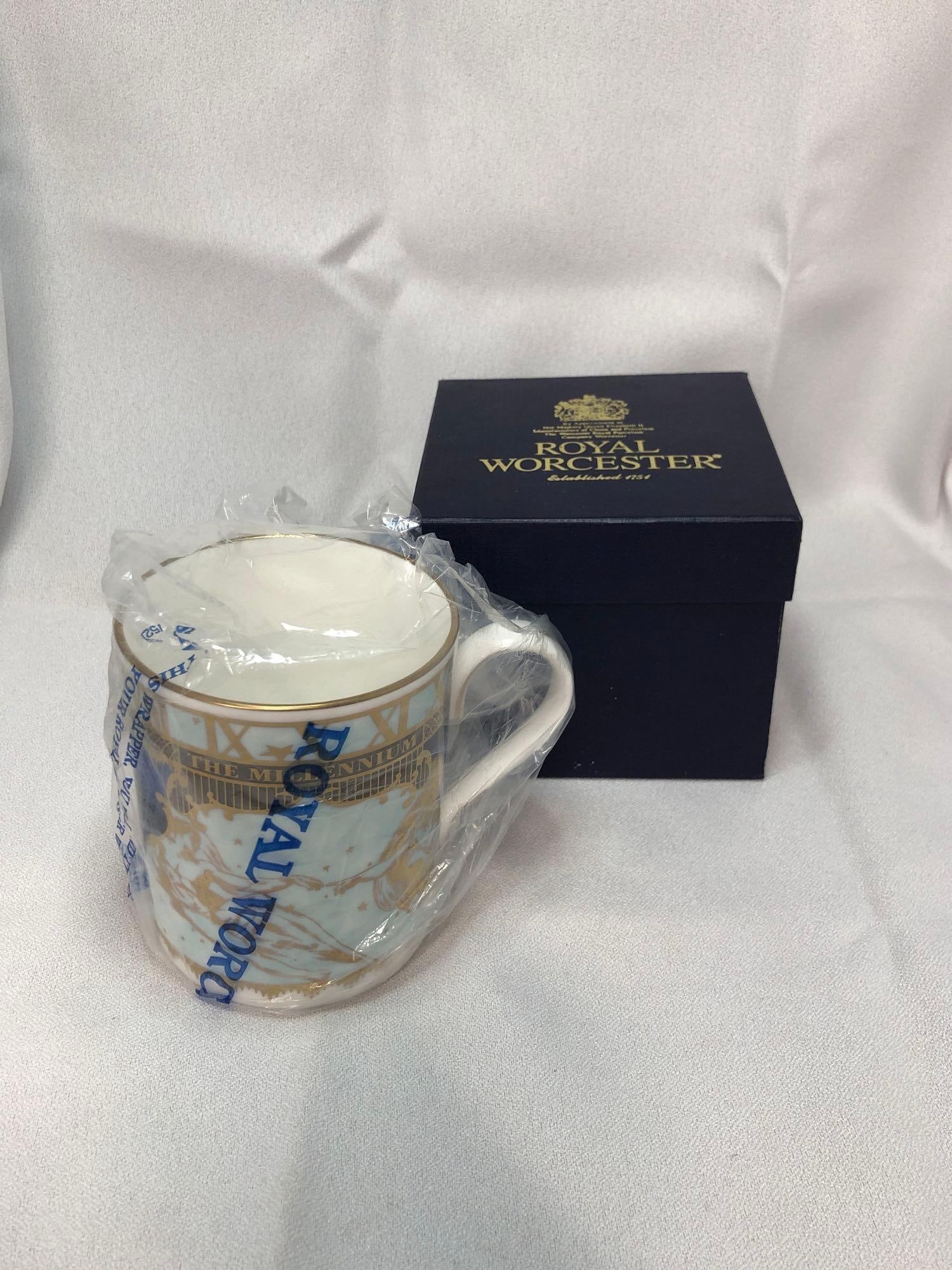 Royal Worcester Mug "To Celebrate The Millennium": Royal Worcester Fine Bone China - 2000 A.D. Limited Edition Collectible Mug "To Celebrate The Millennium." New in Box. The Collectible Mug is approximately 3-3/4" x 4-1/2" x 3-1/4"