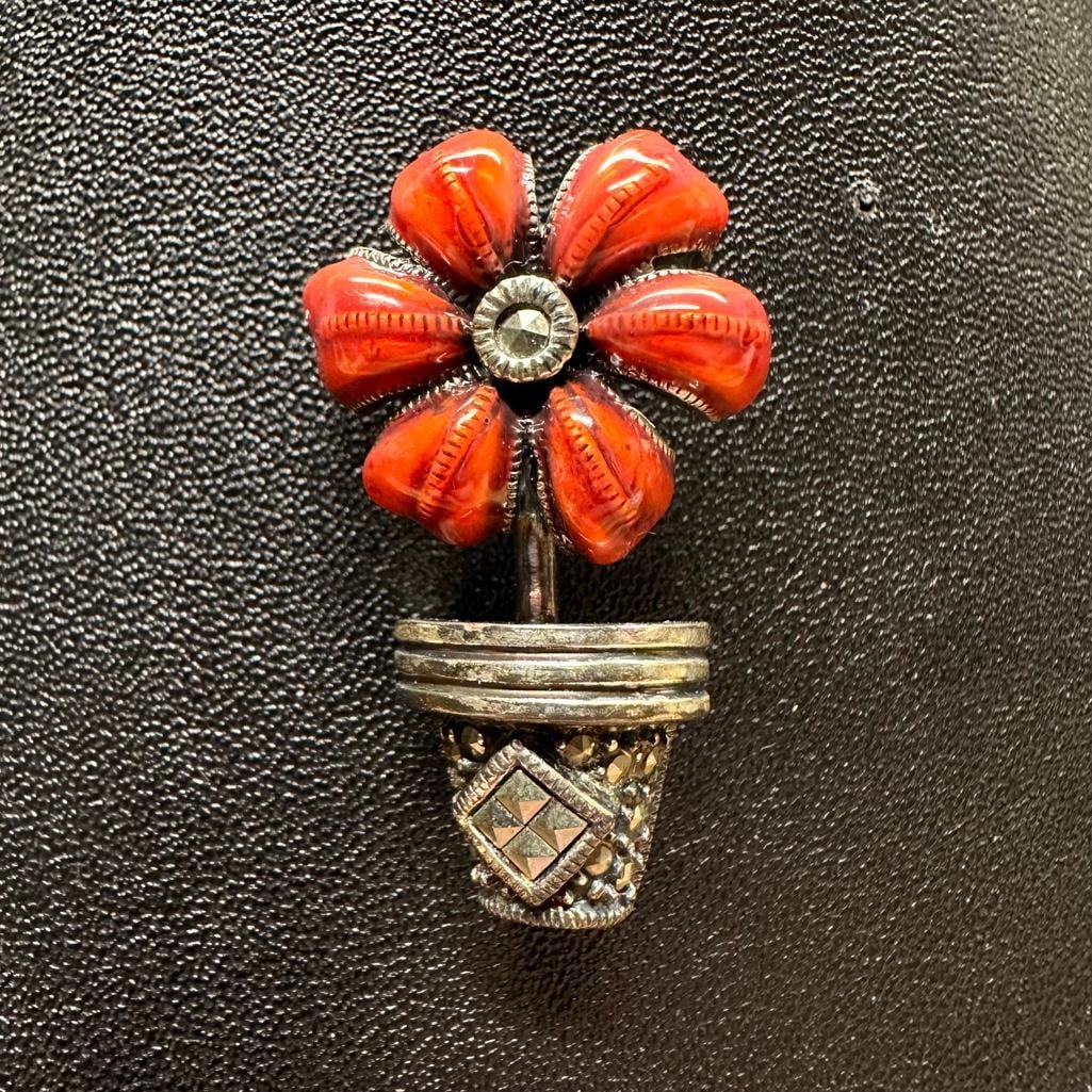 Sterling Silver Marcasite Enamel Flower Pin: This piece of jewelry has been tested and researched prior to listing. Please view all our pictures they are part of our description. DETAILS: Metal - Sterling Silver Color - Silver Stones - none Hall