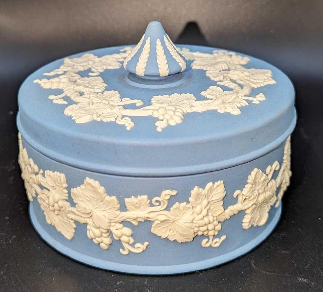 Wedgwood Blue Jasperware Lidded Pot With Finial: Wedgwood Blue Jasperware Lidded Pot With Finial. This is approx 5" x 5" x 4" and it weighs 1.42lb. There are some markings on the top of the lid.