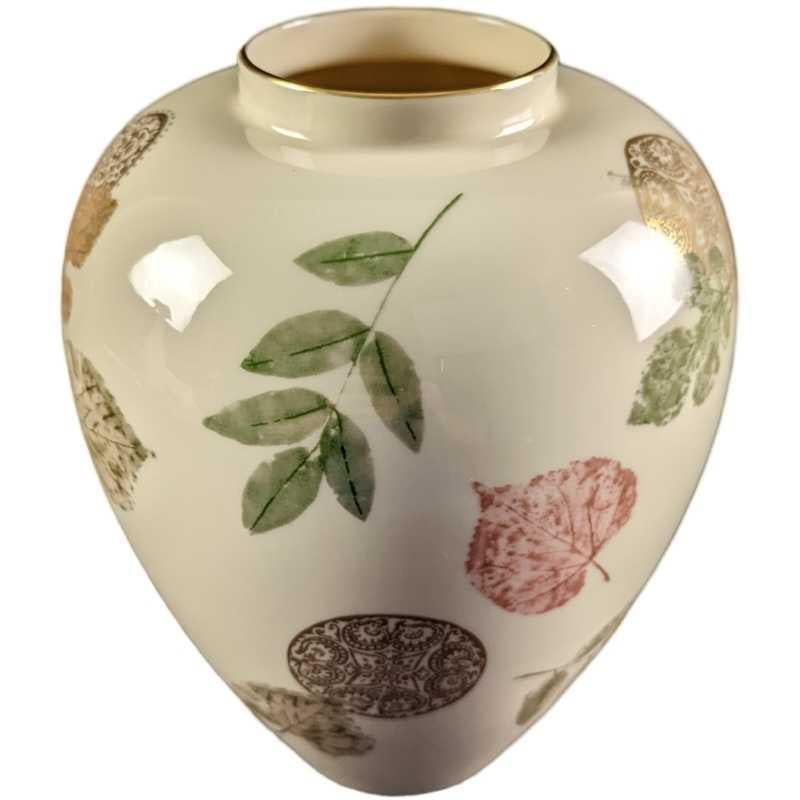 JB Retired Lenox Bone China Vase Nature's Impressions: Retired Lenox Bone China Vase Nature's Impressions. The vase is approx 7" x 7" x 9 1/2" and it weighs 2.28lbs The vase is in a good, used condition with no chips or cracks. There are s