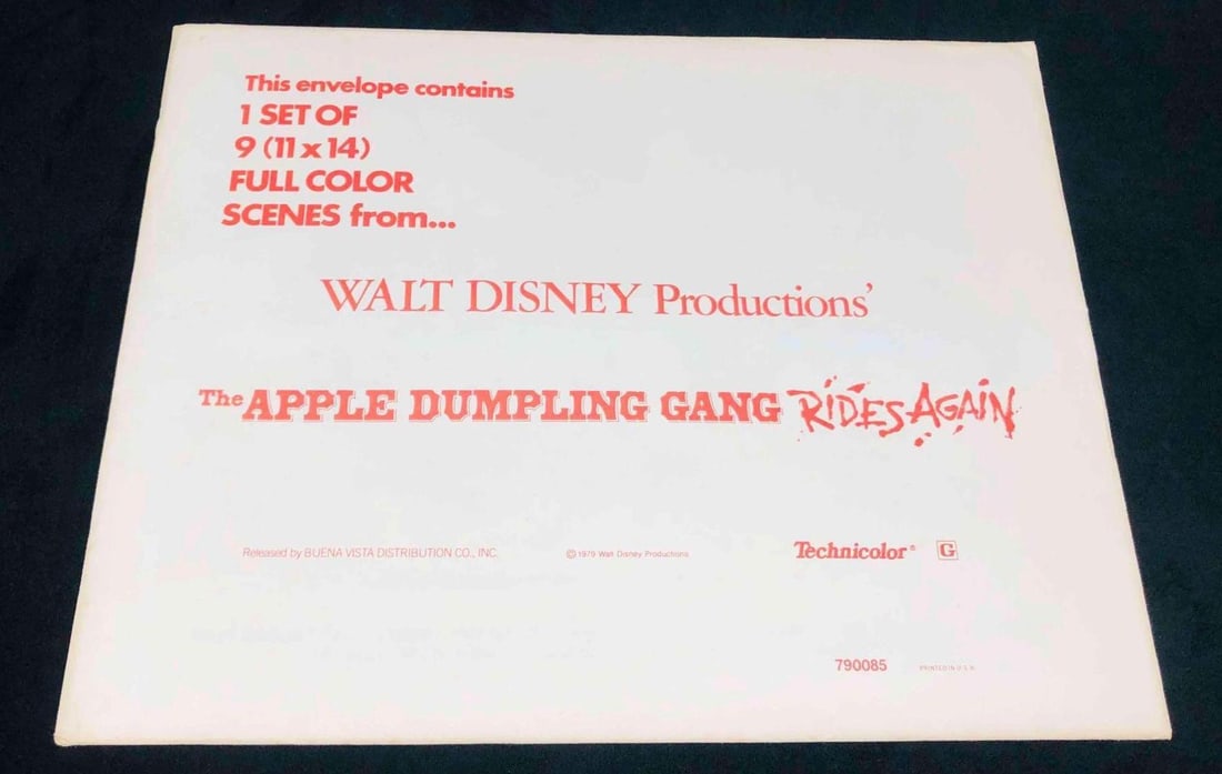9 Sealed Walt Disney Productions' The Apple Dumpling Gang Rides Again Lobby Cards 1979 (A): This lot contains a 9 Sealed Walt Disney Productions' The Apple Dumpling Gang Rides Again Lobby Cards 1979 (A). Each lobby card is approx 11" x 14" and the set weighs about 0.4lbs. The pho