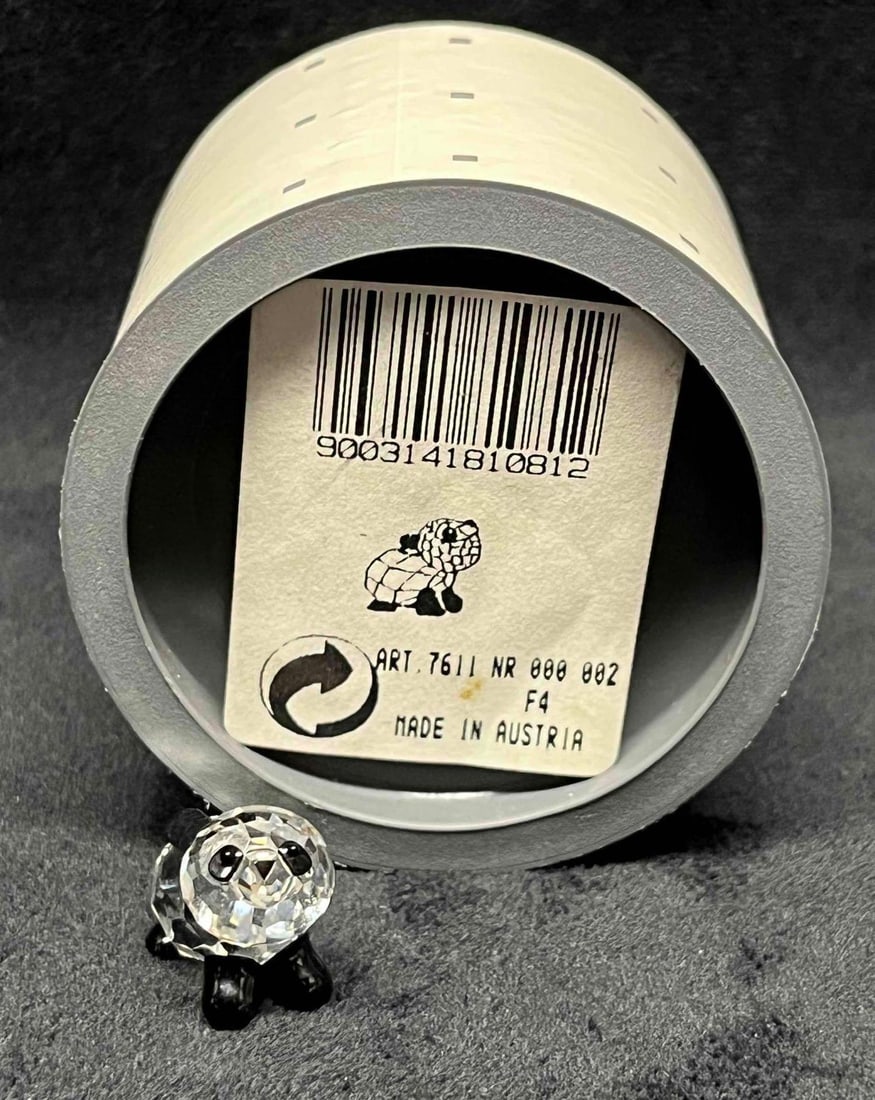 Swarovski Crystal 1994 "Endangered Species" Mini Baby Panda: This lot contains a Swarovski Crystal 1994 "Endangered Species" Mini Baby Panda. The lot includes the original box. Approx weight and measurements are listed below. Overall the Swarovski baby 