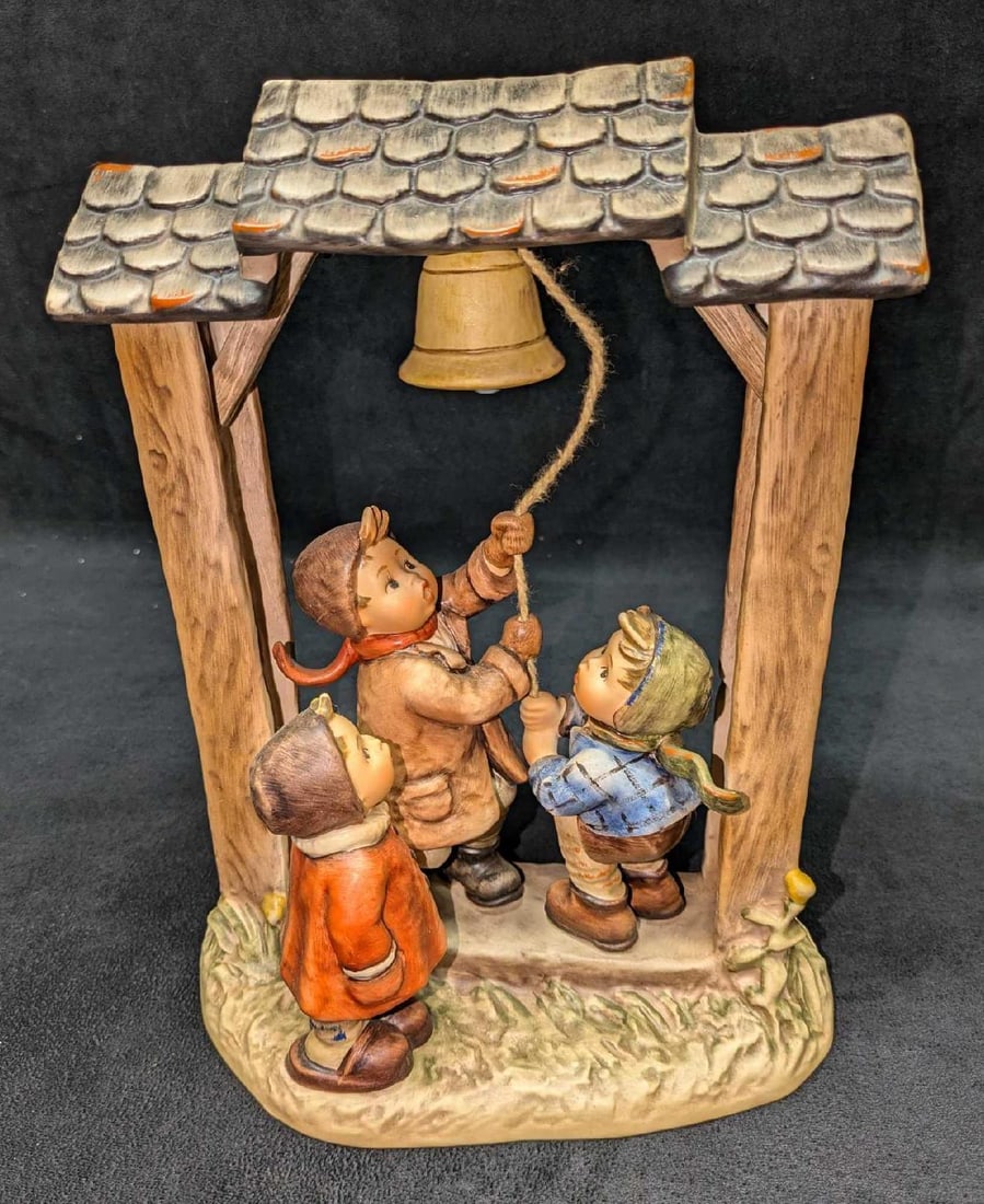 Let’s Tell The World Goebel Hummel “#487 Figurine: Let’s Tell The World Goebel Hummel “#487 Figurine. Made in West Germany in 1990, it is approximately 8" x 4 1/2" x 10 1/4" and weighs 2.69 lbs. The figurine has no chips or cracks. Com